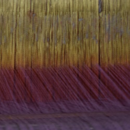 Dyed khadi warp on the loom